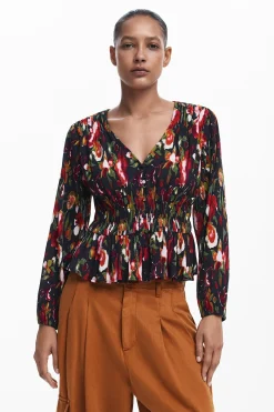 Blusa flores