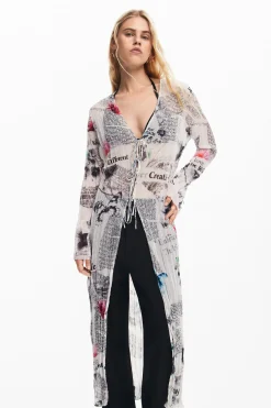 Blusa larga estampado periódico