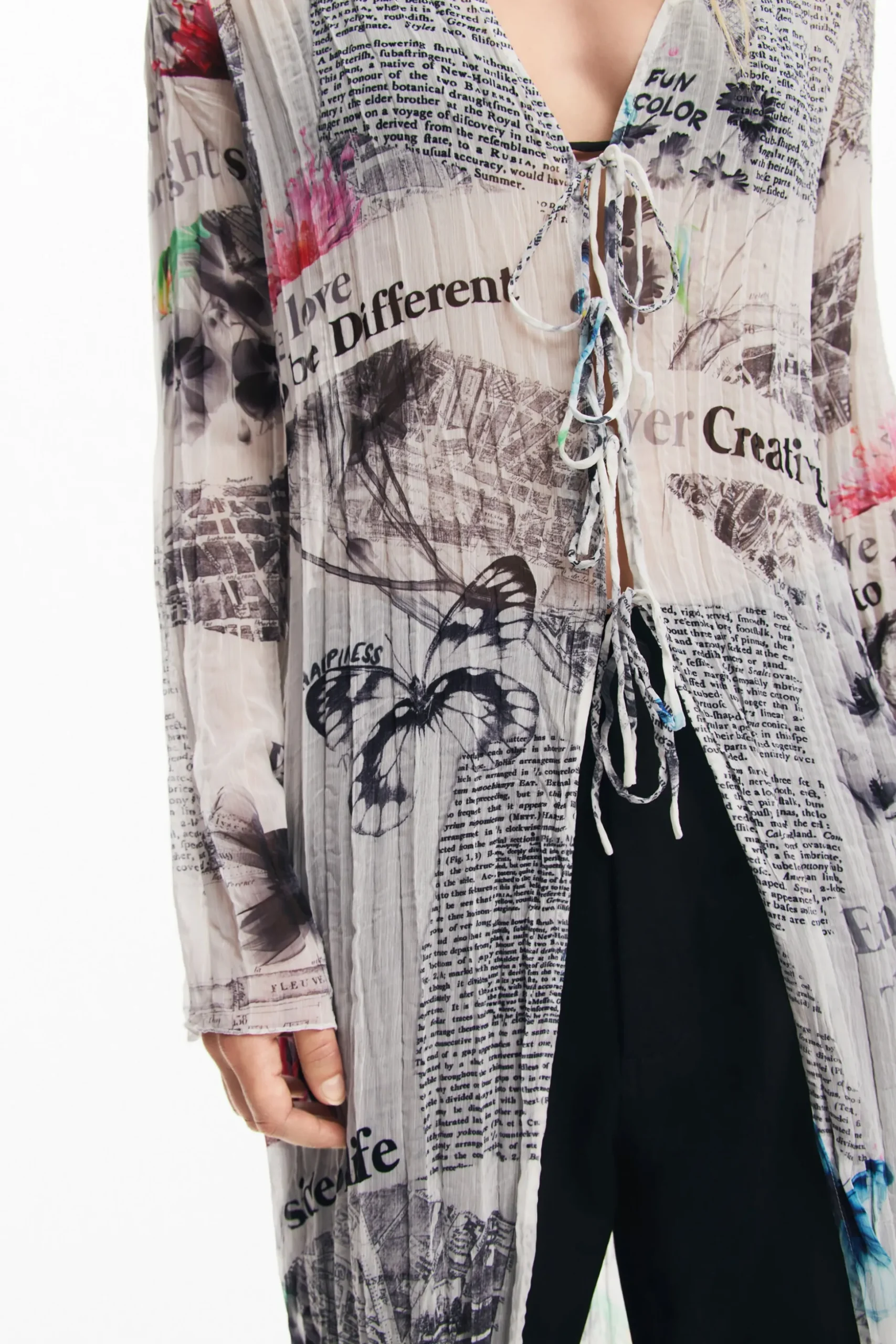 Blusa larga estampado periódico