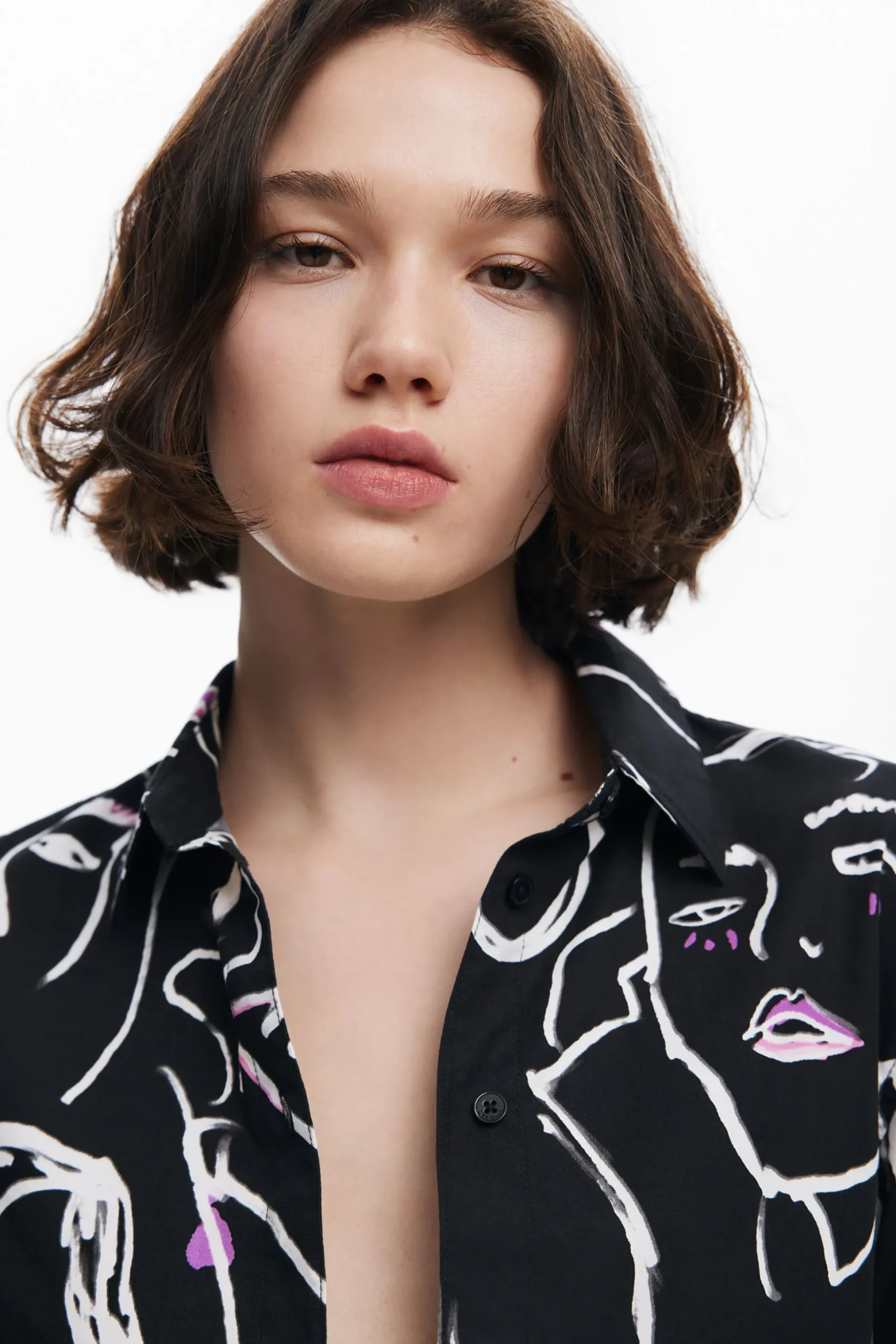 Camisa estampado caras