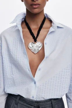 Colgante corazón cinta baño plata Zalio