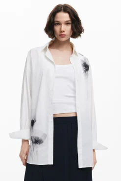 Falda midi pliegues