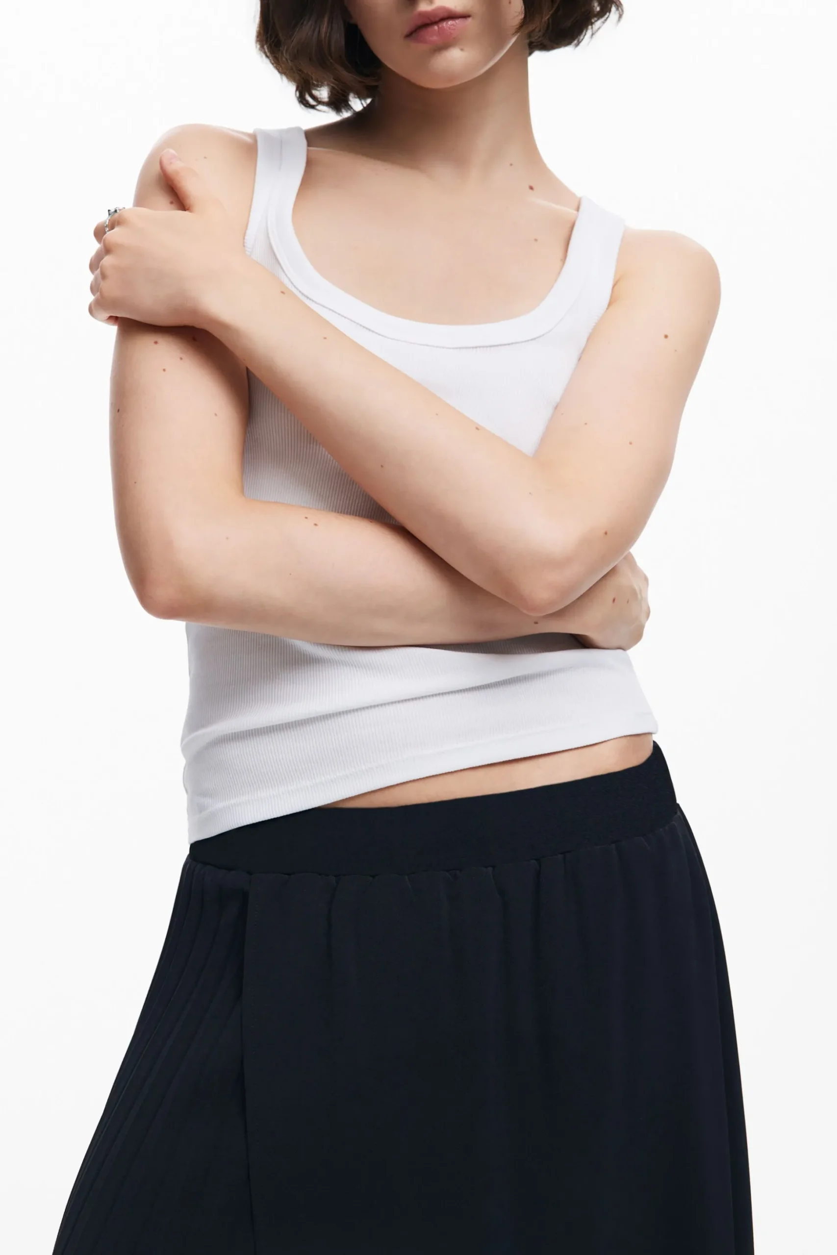 Falda midi pliegues