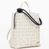 Mochila efecto piel círculos