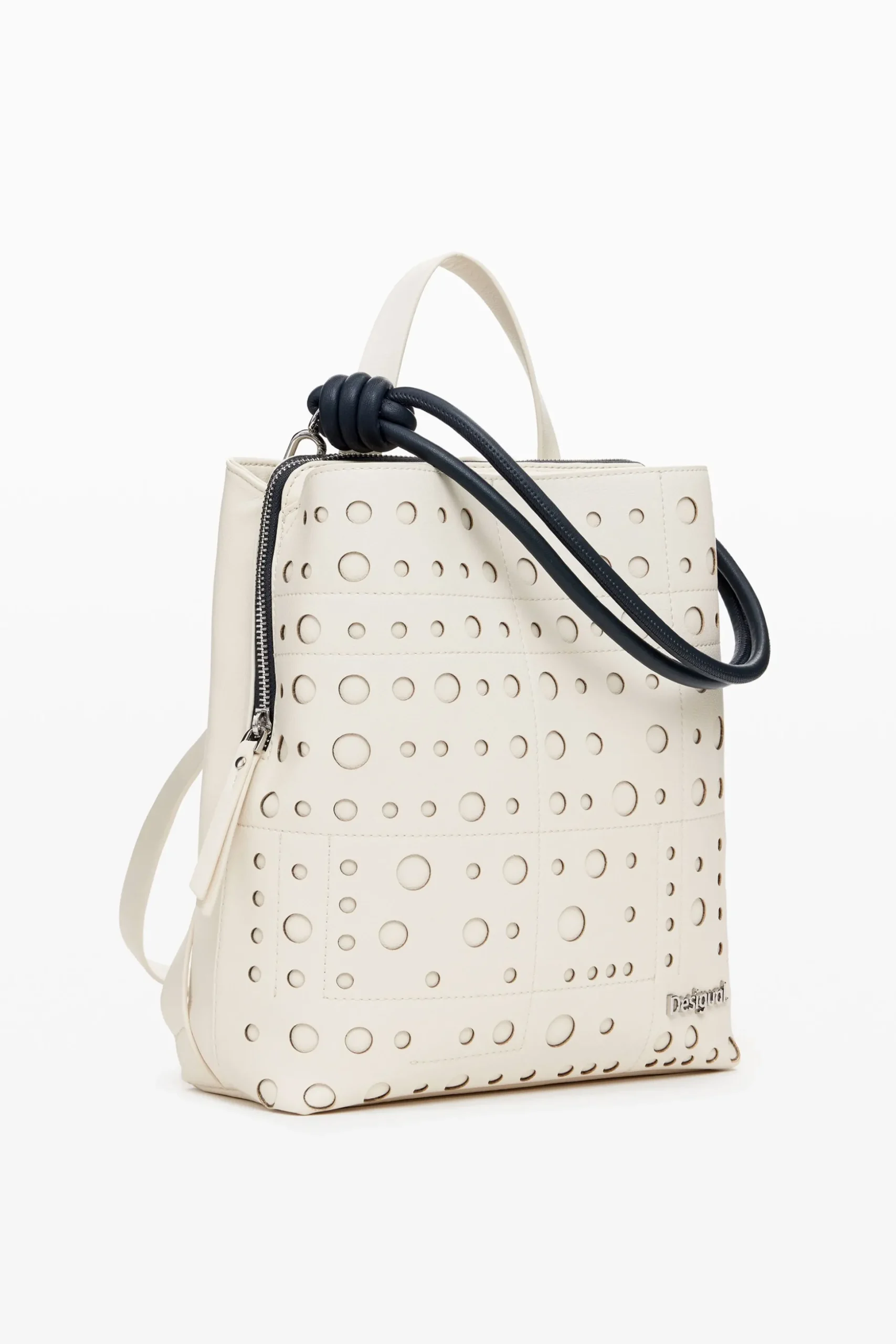 Mochila efecto piel círculos