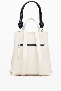 Mochila efecto piel círculos