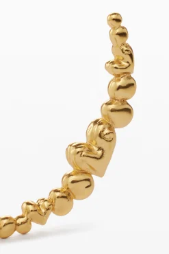 Pendientes aro corazones bañado en oro Zalio