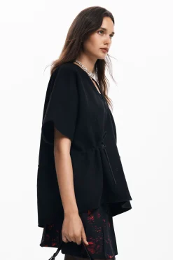 Poncho ajustable