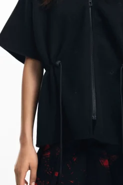 Poncho ajustable