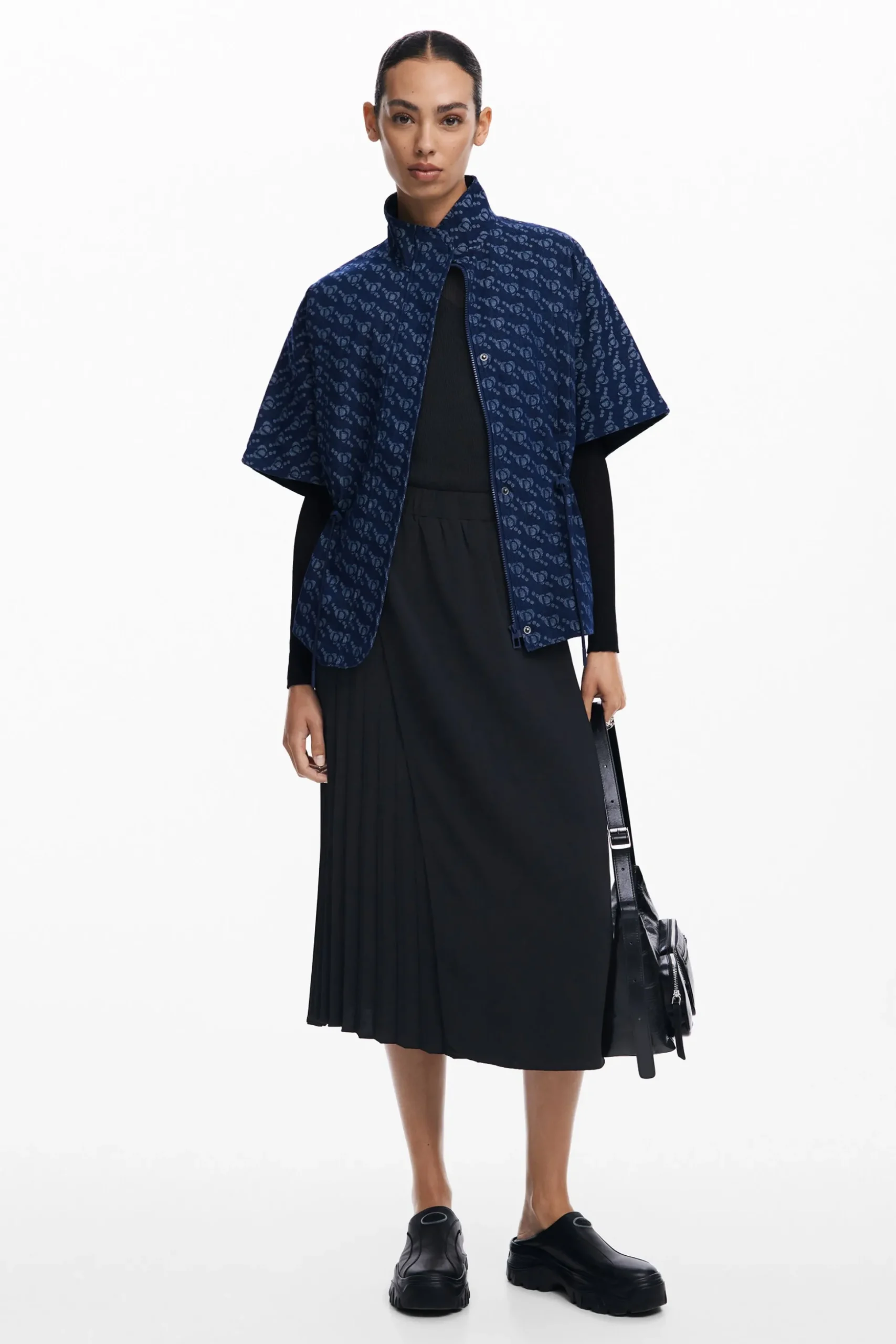 Poncho patrón geométrico